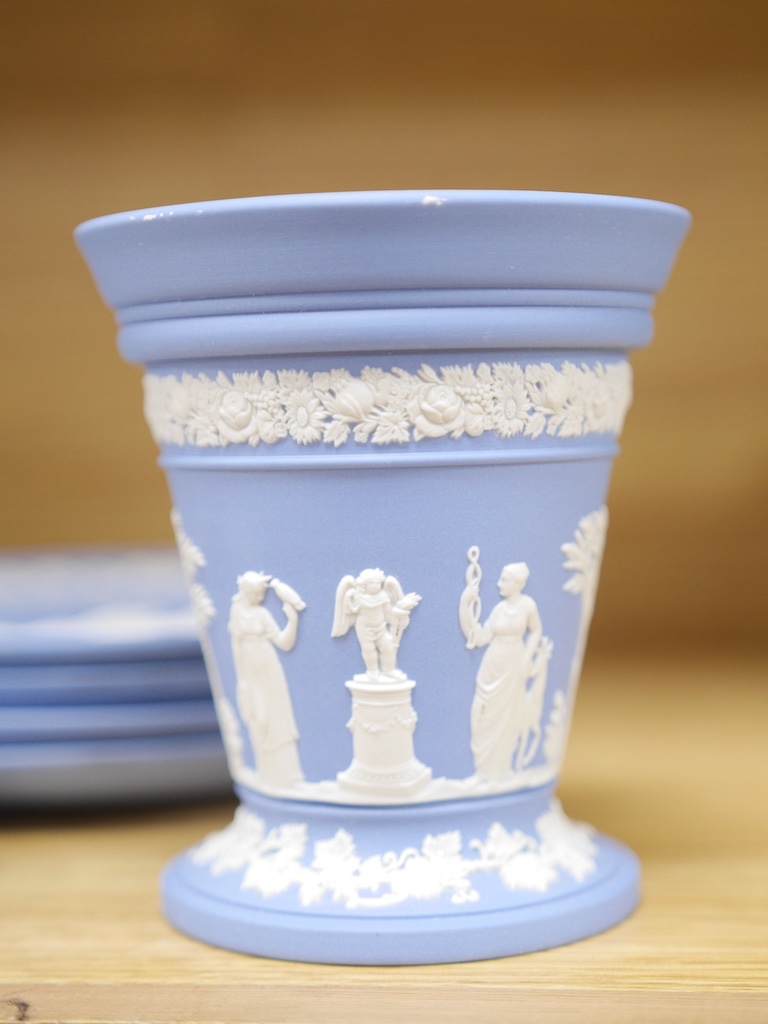 Group of Wedgwood jasper ware to include a pair of vases and a set of eight Christmas plates, largest 21cm in diameter. Condition - good